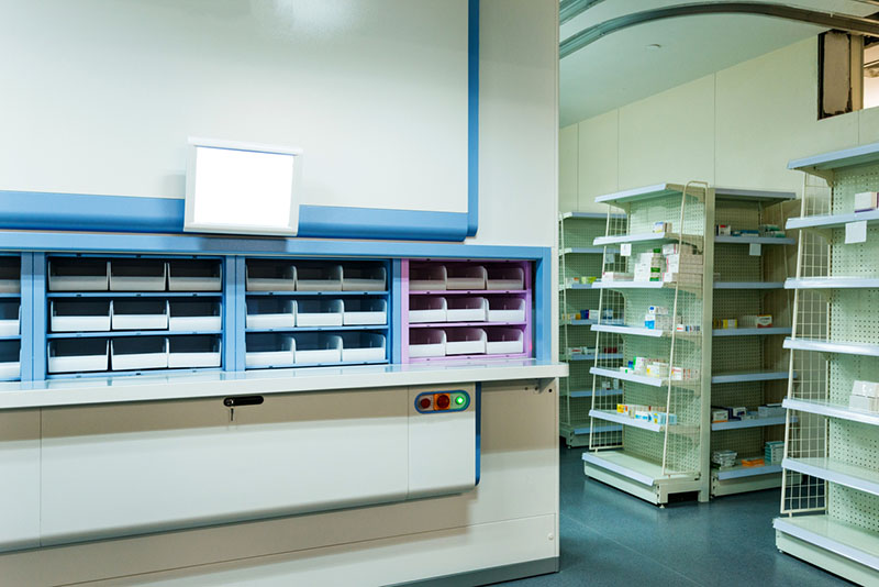 Many shelves in a pharmacy