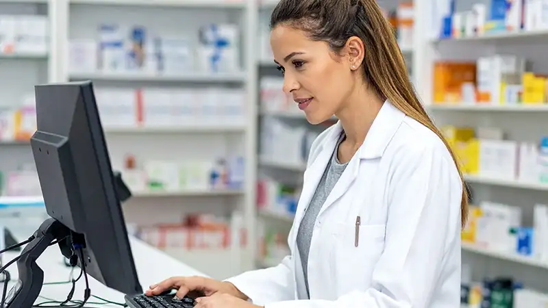 pharmacist checking rpm data