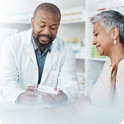 pharmacist speaking with patient about me